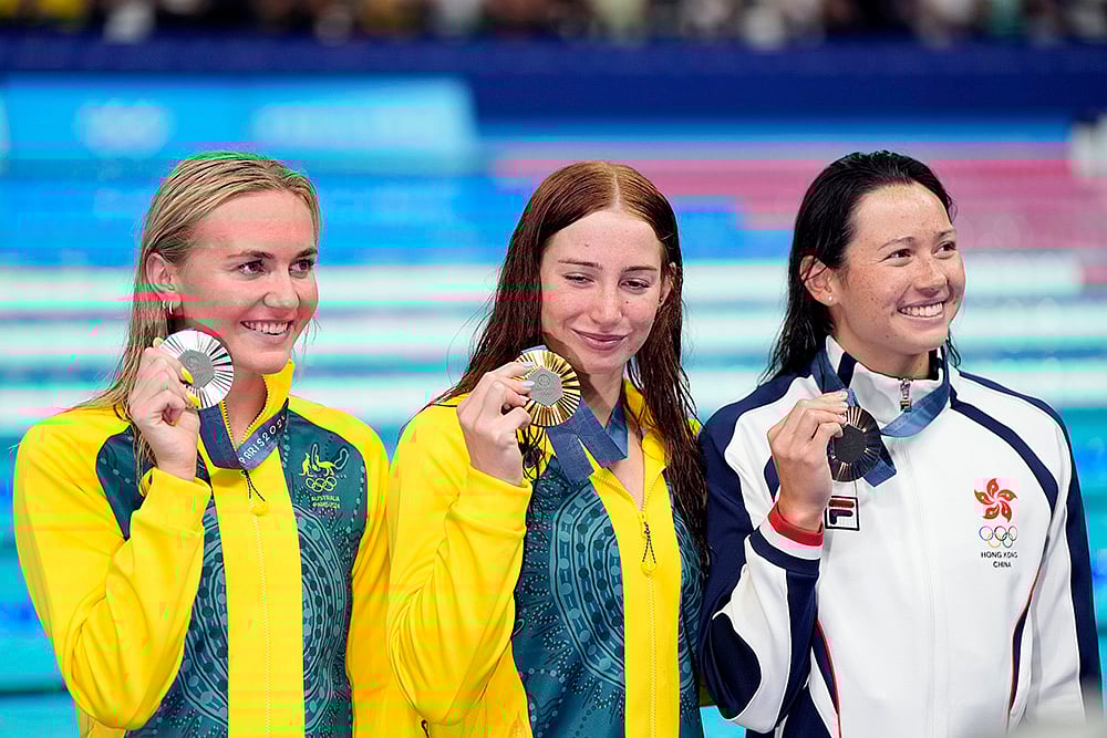 | Photo: AP/Martin Meissner : Ariarne Titmus, Gold medalist Mollie O'Callaghan and Siobhan Bernadette Haughey